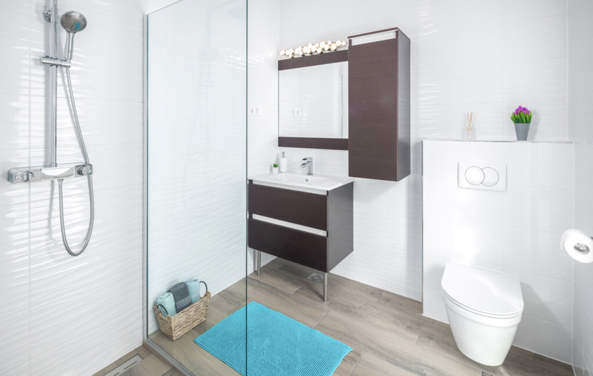 Villa Mia bathroom with shower, vanity and laundry facilities