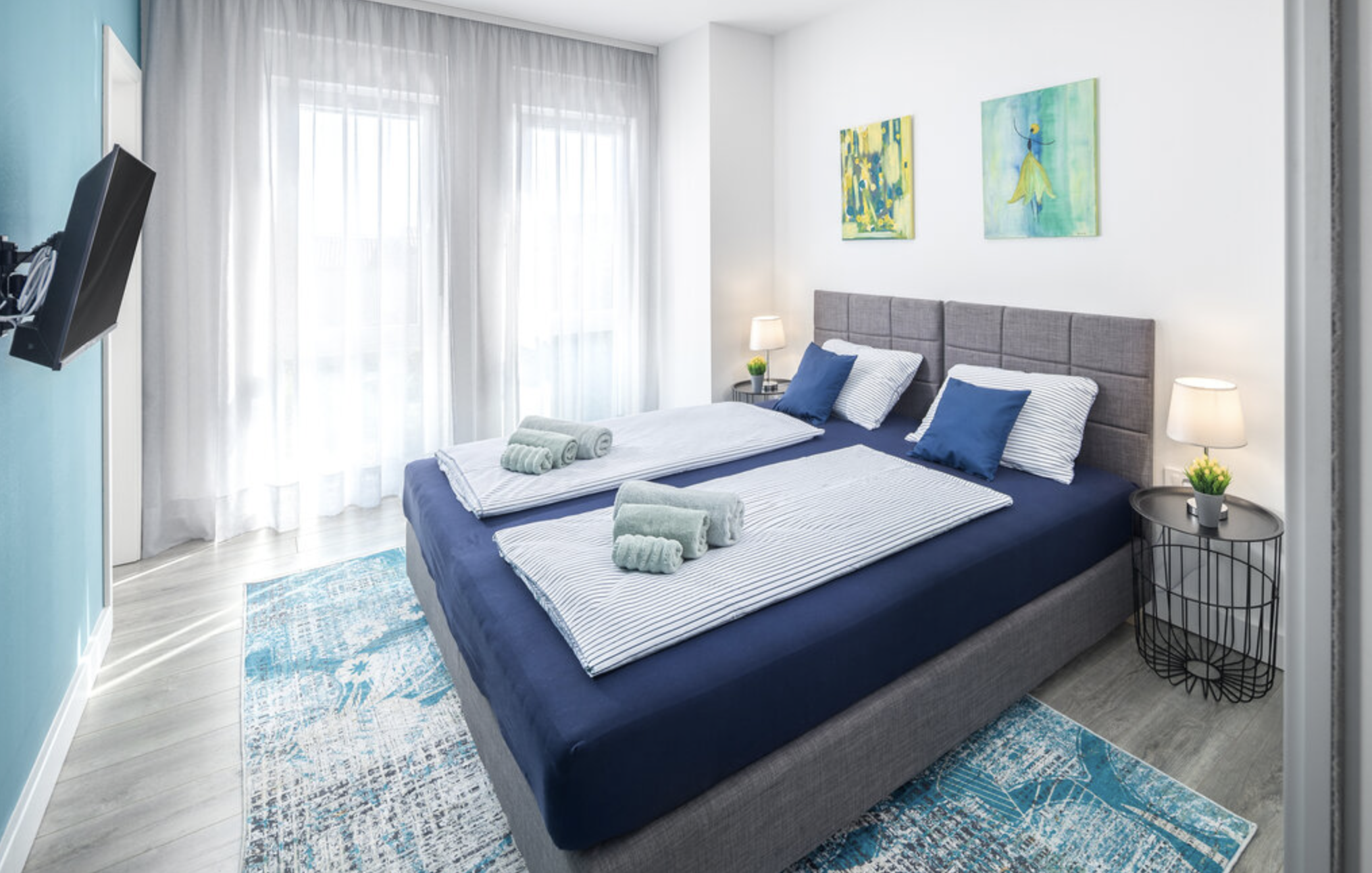 Calm Villa Mia bedroom with blue accents