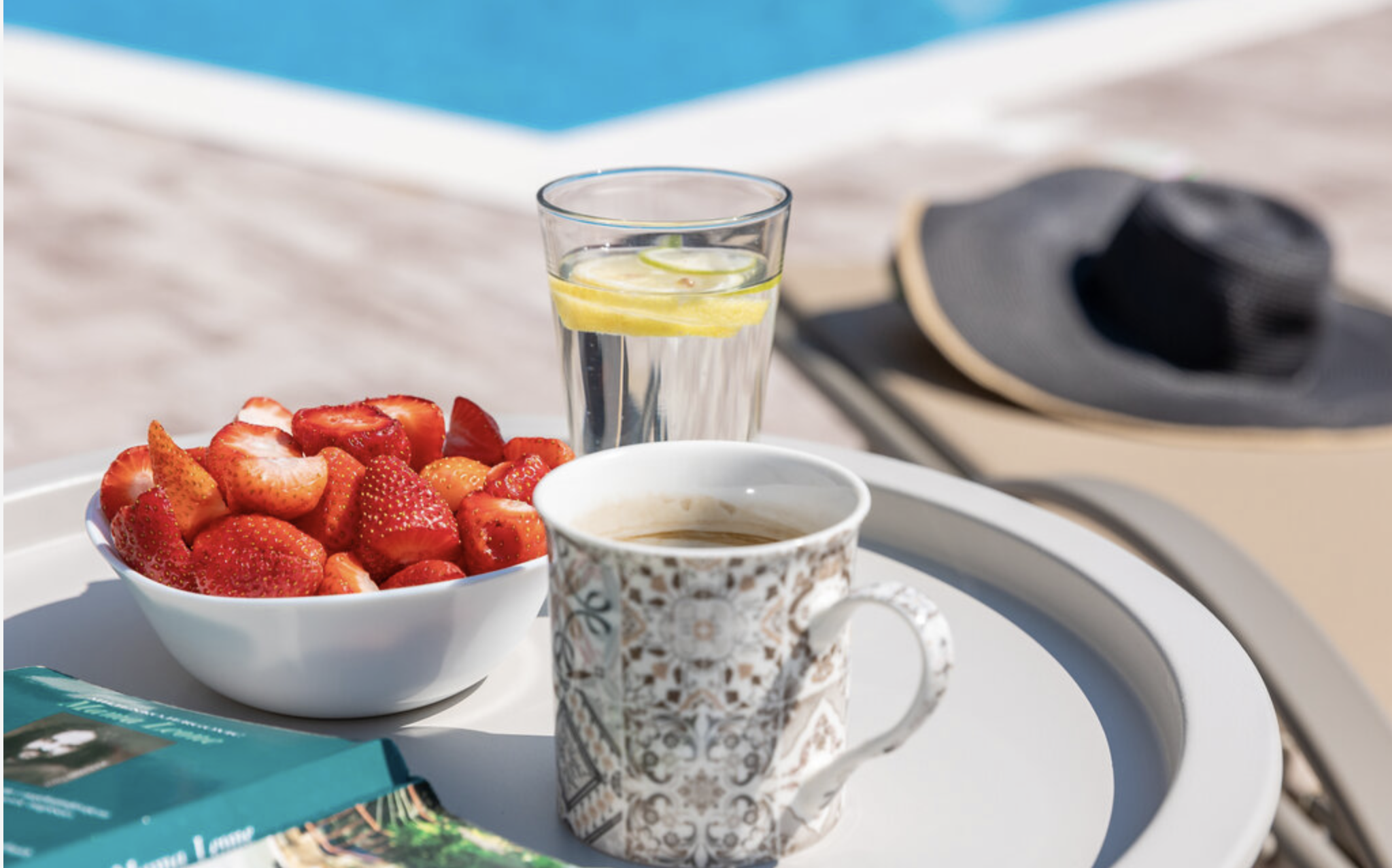 Breakfast table beside the Villa Mia pool